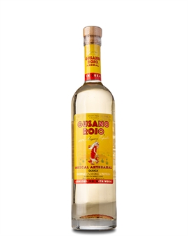 Gusano Rojo Mezcal bottle with worm at the bottom and red label