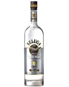 Beluga Noble bottle with white label and metal fish emblem attached